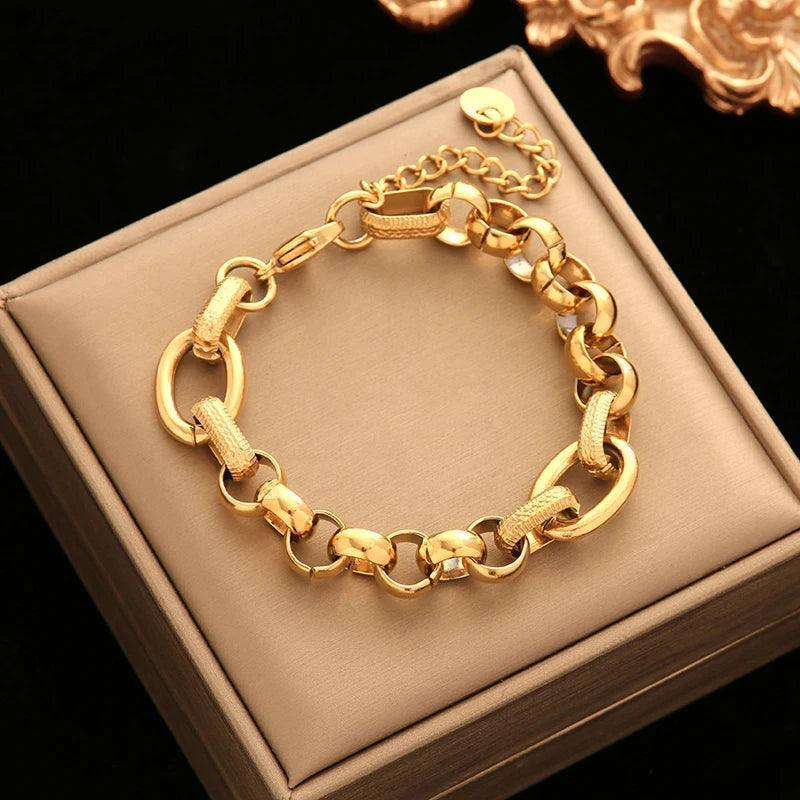 Pulseira de Aço Inoxidável Torcida Banhada a Ouro 18k - Heraki Joias