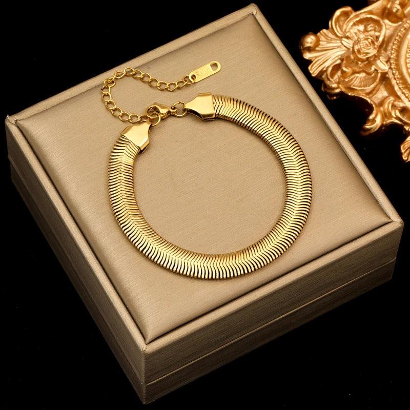 Pulseira de Aço Inoxidável Torcida Banhada a Ouro 18k - Heraki Joias