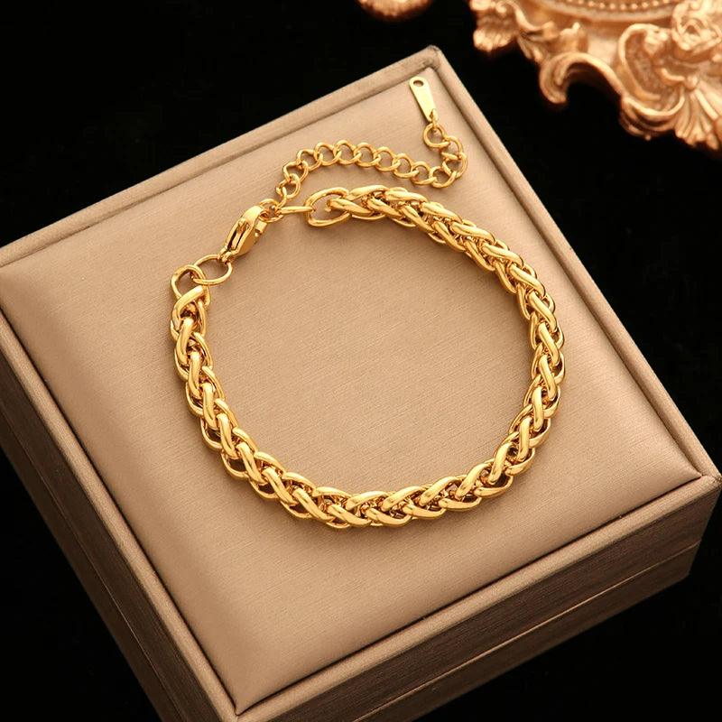 Pulseira de Aço Inoxidável Torcida Banhada a Ouro 18k - Heraki Joias