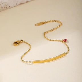 Pulseira Elegante com Coração de Zircão Vermelho em Aço Inoxidável