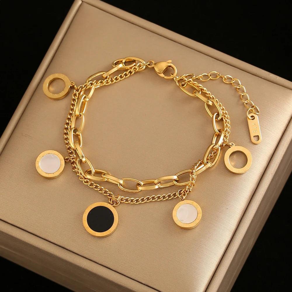 Pulseira de Aço Inoxidável com Charme de Numerais Romanos - Heraki Joias