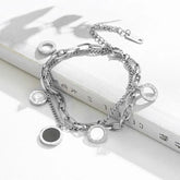 Pulseira de Aço Inoxidável com Charme de Numerais Romanos - Heraki Joias