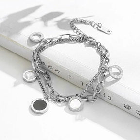 Pulseira de Aço Inoxidável com Charme de Numerais Romanos - Heraki Joias
